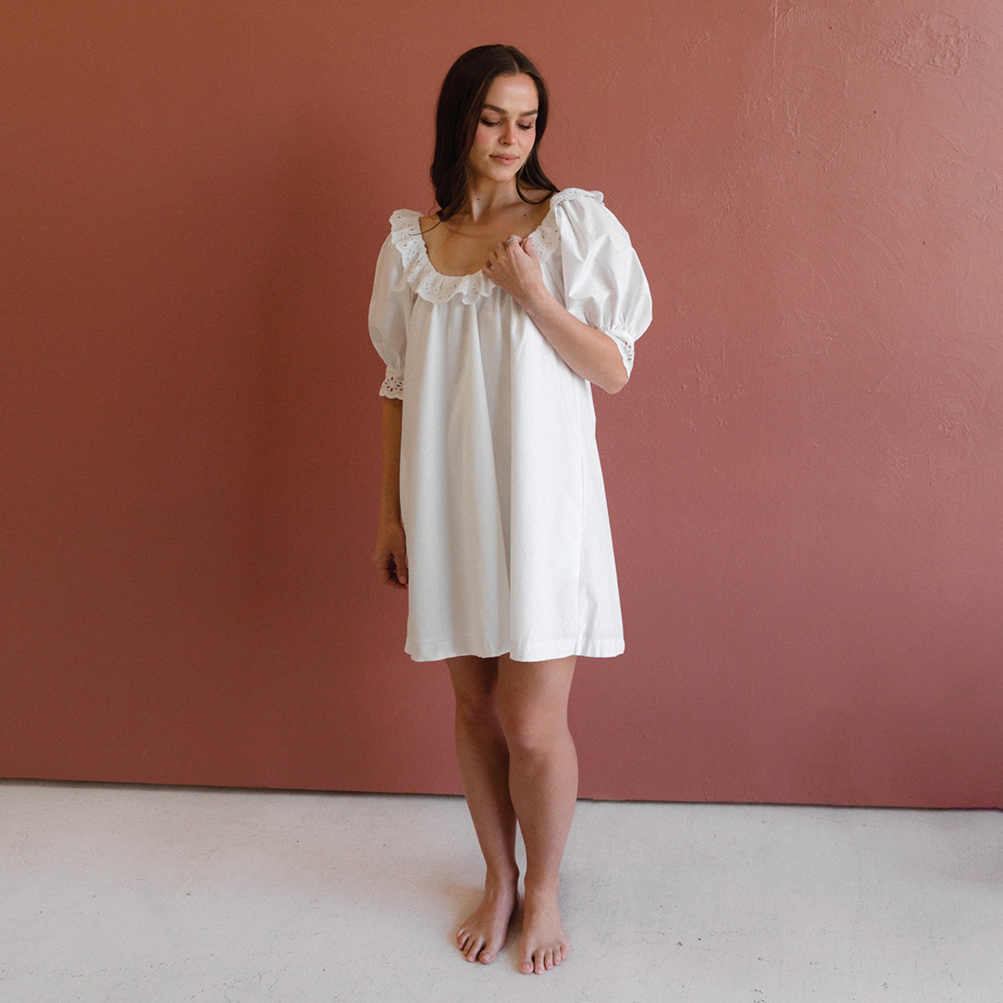 white shift dress with eyelet detailing