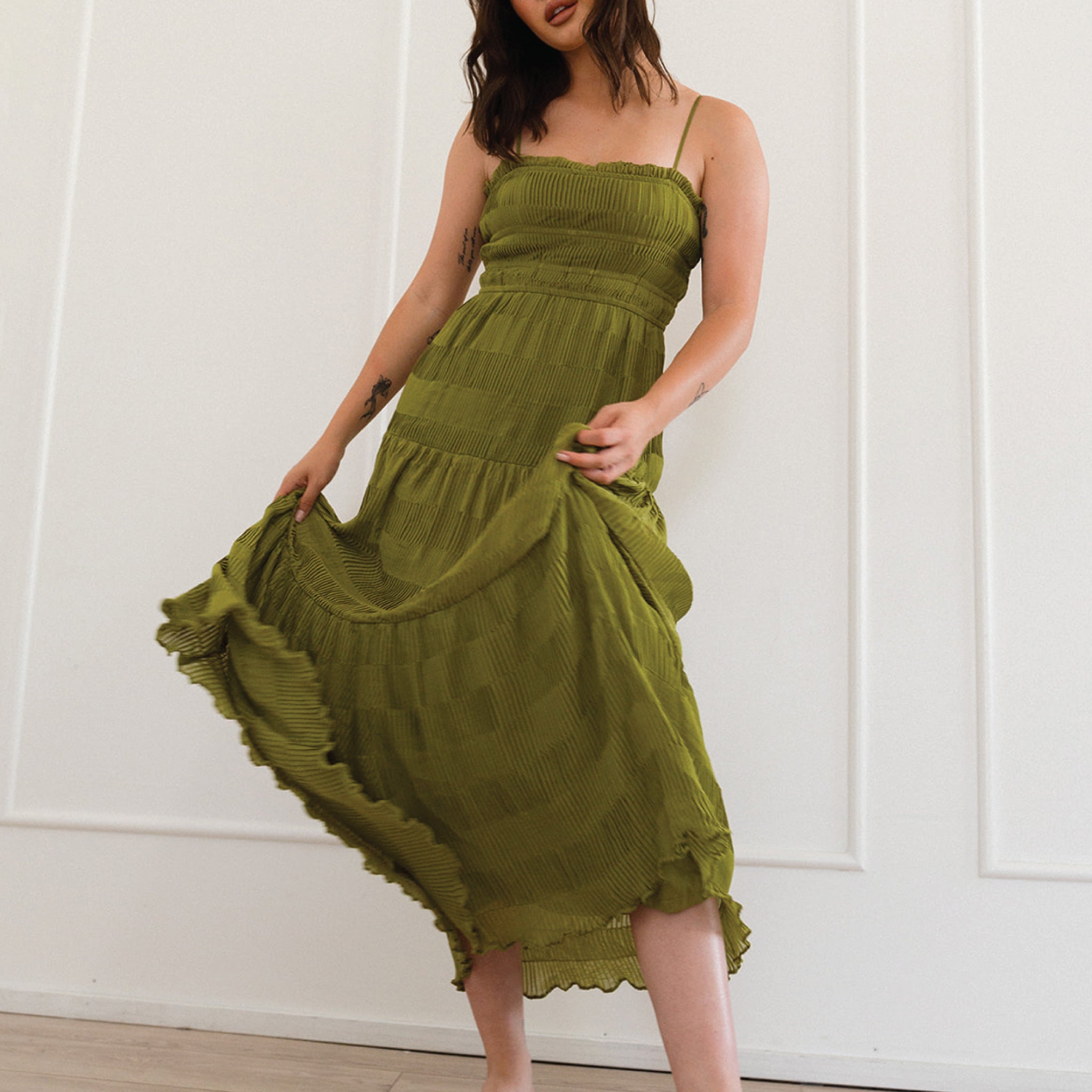 green tiered midi dress